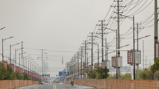 Power lines in Yichun, China. Source:  /Bloomberg