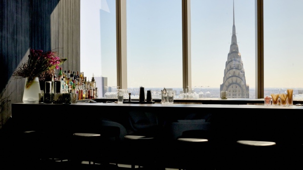 A bar area at American Express Centurion New York. Photographer: Gabby Jones/Bloomberg