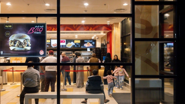 Customers queue at local Saudi fast food outlet Albaik in Riyadh. Photographer: Tasneem Alsultan/Bloomberg