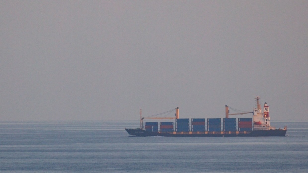 OBOCK, DJIBOUTI - JANUARY 19: The container ship, Kota Rahmat - with the destination 'VSL NO LINK ISRAEL' - approaches the Bab-el-Mandeb strait on January 18, 2024 in Obock, Djibouti. Many cargo ships crossing into the Red Sea are declaring that they have no links to Israel to avoid being targeted by Yemen’s Houthi rebel groups. Attacks on commercial ships by Yemen's Houthi rebel group, who say they are acting in protest of Israel's war in Gaza, have imperilled a vital global shipping route through the Bab-el-Mandeb strait that lies between Yemen and Djibouti and connects the Gulf of Aden and Red Sea. The disruption has forced more shipping companies to divert around the Horn of Africa, upending supply chains and increasing costs. (Photo by Luke Dray/Getty Images)
