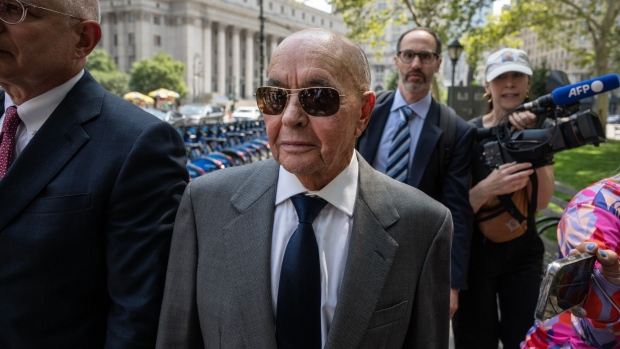 Joe Lewis, owner of Tottenham Hotspur Football Club, center, leaves court in New York, US, on Wednesday, July 26, 2023. Lewis is accused of abusing his access to corporate boardrooms to pass on inside information to his friends, staff on board his superyacht, personal pilots and romantic interests.