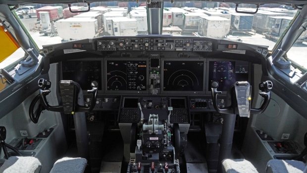 The cockpit of a grounded Lion Air Boeing Co. 737 Max 8 aircraft is seen at terminal 1 of Soekarno-Hatta International Airport in Cenkareng, Indonesia, on Tuesday, March 15, 2019. Sunday’s loss of an Ethiopian Airlines Boeing 737, in which 157 people died, bore similarities to the Oct. 29 crash of another Boeing 737 Max plane, operated by Indonesia’s Lion Air, stoking concern that a feature meant to make the upgraded Max safer than earlier planes has actually made it harder to fly.