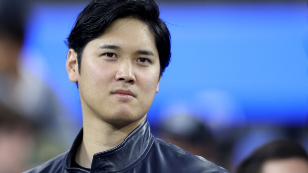 INGLEWOOD, CALIFORNIA - DECEMBER 21: Shohei Ohtani of the Los Angeles Dodgers looks on prior to the game between the New Orleans Saints and the Los Angeles Rams at SoFi Stadium on December 21, 2023 in Inglewood, California. (Photo by Sean M. Haffey/Getty Images) Photographer: Sean M. Haffey/Getty Images North America