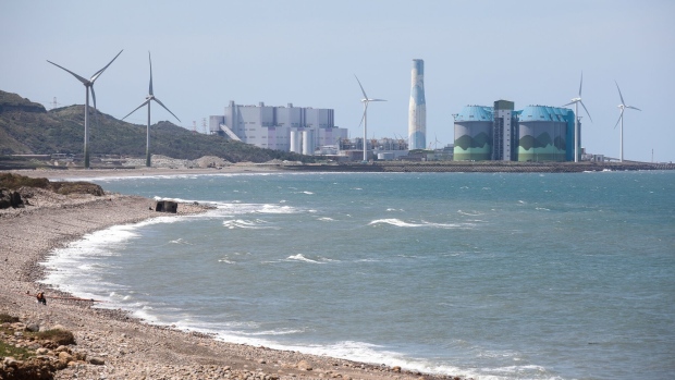 Wind vs coal. Taiwan is struggling with the cost of a plan to green its energy mix. Photographer: I-Hwa Cheng/Bloomberg