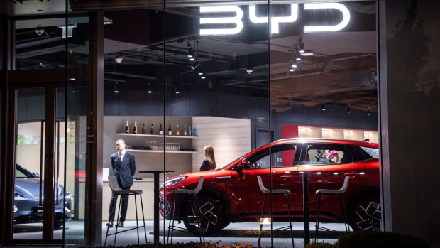 A BYD Co. showroom in Hong Kong, China, on Saturday, Jan. 13, 2024. BYD capped a stellar 2023 by overtaking Tesla as the biggest seller of fully electric vehicles globally in the fourth quarter. Photographer: Lam Yik/Bloomberg