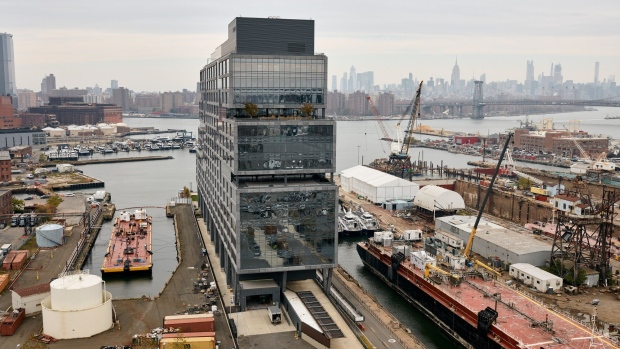 Dock 72, a 16-story office building, at the Brooklyn Navy Yard campus in the Brooklyn borough of New York, US, on Tuesday, Nov. 7, 2023. Some $3.5 billion in venture capital funding has flowed into New York City's climate tech sector since 2021, according to Climate Tech VC, an independent market research company. Photographer: Gabby Jones/Bloomberg