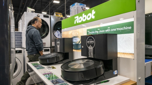 An iRobot Roomba vacuum inside a Best Buy store on Black Friday in Union City, California, US, on Friday, Nov. 24, 2023. An estimated 182 million people are planning to shop from Thanksgiving Day through Cyber Monday, the most since 2017, according to the National Retail Federation.