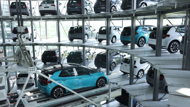 Electric cars in a storage tower at a Volkswagen production facility in Dresden, Germany.