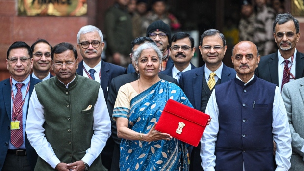 Nirmala Sitharaman, India's finance minister, center, and other members of the finance ministry leave the ministry to present the budget at the parliament in New Delhi, India, on Thursday, Feb. 1, 2024. Prime Minister Narendra Modi will likely use India's last budget before the elections to woo voters with new spending measures, while avoiding a fiscal deficit increase.