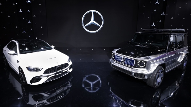 A Mercedes-Benz Group AG Concept EQG, right, and the Mercedes-AMG C 63 S E Performance vehicle on display at the Japan Mobility Show in Tokyo, Japan, on Wednesday, Oct. 25, 2023. Japan's carmakers are staging their first motor show in four years to make the case they'll remain major forces to be reckoned with in the electric-vehicle age. Photographer: Kiyoshi Ota/Bloomberg