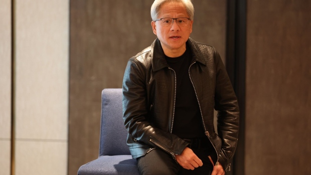 Jensen Huang, co-founder and chief executive officer of Nvidia Corp., speaks at a roundtable in Singapore, on Wednesday, Dec. 6, 2023. Huawei Technologies Co. is among a field of “very formidable” competitors to Nvidia in the race to produce the best AI chips, according to Huang.