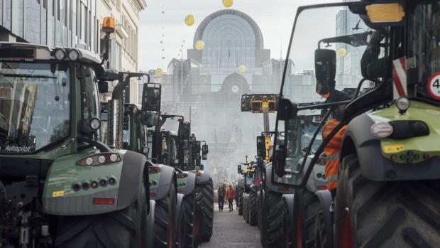 Tractors block the streets during a protest by farmers in Brussels, Belgium, on Thursday, Feb. 1, 2024. At least 1,300 tractors clogged streets in Brussels near European Union institutions Thursday morning as farmers staged a protest aimed at the bloc’s leaders meeting nearby for a summit.