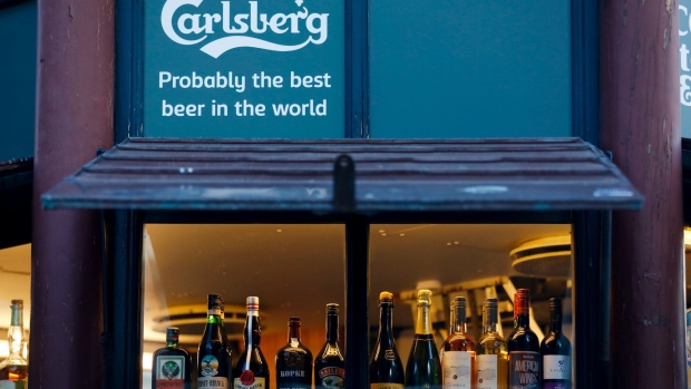 An advertisement for Carlsberg A/S in Copenhagen. Photographer: Luke MacGregor/Bloomberg