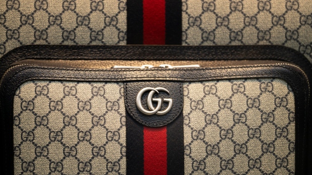 A Savoy trolley case in the window of the Gucci Valigeria luxury luggage boutique, operated by Kering SA, in central Paris, France, on Monday Feb. 5, 2024. Kering report full year earnings on Feb. 8. Photographer: Benjamin Girette/Bloomberg