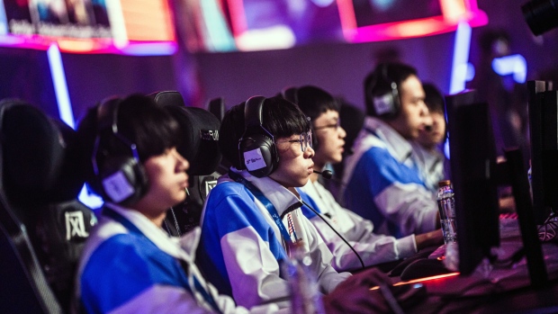Players of the Malaysian team compete during a League of Legends esport tournament.