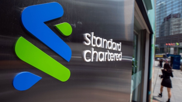 Signage at a Standard Chartered Plc bank branch in Hong Kong, China, on Tuesday, Feb. 14, 2023. Standard Chartered is scheduled to release earnings results on Feb. 16. Photographer: Paul Yeung/Bloomberg