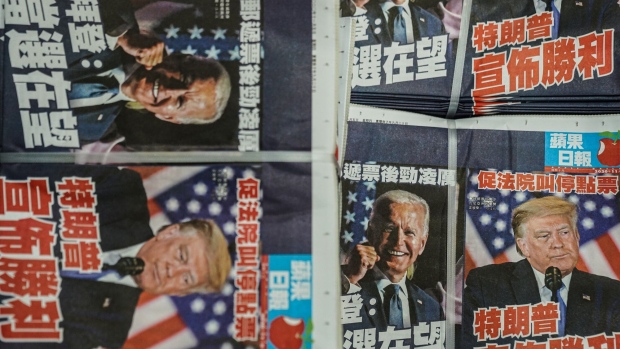Copies of the Apple Daily newspaper, published by Next Digital Ltd., at the company's printing facility in Hong Kong, China, early on Thursday, Nov. 5, 2020. Democrat Joe Biden took narrow leads over Donald Trump in two critical Midwestern states with the presidential race hanging in the balance for a second day.