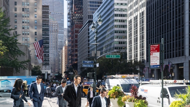 Pedestrians on Park Avenue in New York, US, on Wednesday, Oct. 12, 2022. Park Avenue's density of office space and proximity to transit—some commuters from Greenwich and other suburbs can reach their buildings from below street level—make it a bellwether for the future of commercial real estate in New York.