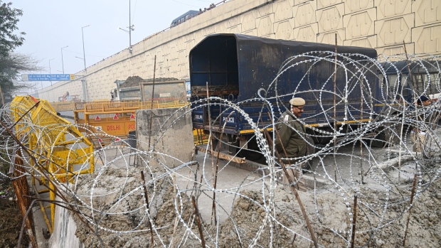 A polilce barricade in New Delhi.  Photographer: Prakash Singh/Bloomberg