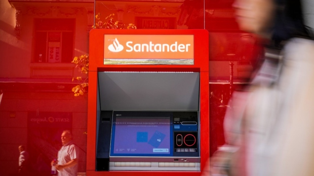An automated teller machine (ATM) outside a Banco Santander SA bank branch in Madrid, Spain, on Wednesday, July 26, 2023. Banco Santander’s earnings beat estimates as its domestic market became the Spanish lender’s top profit maker for the first time in more than a decade, boosted by rising interest rates. Photographer: Paul Hanna/Bloomberg