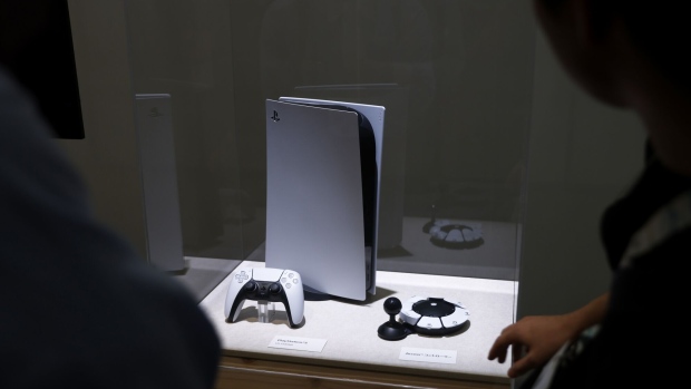 A PlayStation 5 (PS5) video game console and a controller at the Sony Group Corp. booth at the Combined Exhibition of Advanced Technologies (Ceatec) in Chiba, Japan, on Tuesday, Oct. 17, 2023. Ceatec, the annual information technology and electronics trade show, will run through Oct. 20.