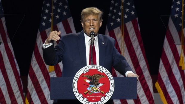 Former US President Donald Trump speaks during the National Rifle Association (NRA) Great American Outdoor Show Presidential Forum in Harrisburg, Pennsylvania, US, on Friday, Feb. 9, 2024. Trump is on the cusp of clinching the GOP nomination, a contest he has sought to wrap up quickly so that he can pivot to running against President Joe Biden, even as a series of court cases threaten to keep the former president from the trail.