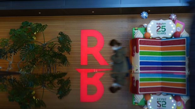 The logo of Rakuten Group Inc. at the company's head office in Tokyo, Japan, on Friday, Feb. 18, 2022. About 11% of the Japanese population had received a third dose of the vaccine as of Tuesday, according to Bloomberg data. Photographer: Toru Hanai/Bloomberg