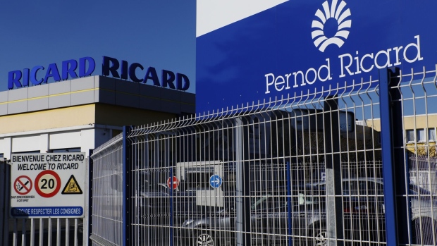 Logos sit outside the Pernod Ricard SA alcoholic beverage plant and warehouse in Vendeville, France, on Monday, Feb. 25, 2019. Pernod Ricard is considering a sale of its wine division, which includes Australia’s Jacob’s Creek and Spain’s Campo Viejo labels, according to people familiar with the matter. Photographer: Luke MacGregor/Bloomberg