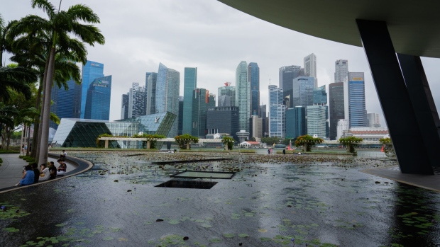 Buildings in the central business district in Singapore, on Wednesday, Feb. 14, 2024. Singapore's economy expanded by a slightly more modest pace than initially expected in 2023, as manufacturing activity contracted and services growth slowed.
