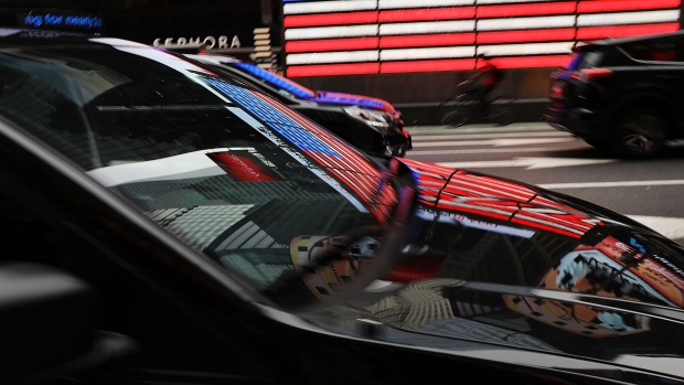 NEW YORK, NY - JULY 30: A ride hailing vehicle moves through traffic in Manhattan on July 30, 2018 in New York City. After a significant increase in local traffic and a spate of suicides by taxi drivers, New York City is planning to vote on capping ride-sharing services such as Uber and Lyft. The City Council's move to vote on the measures could come as soon as Aug. 8. If the vote was to succeed, New York City would become the first major U.S. municipality to cap ride-sharing services. (Photo by Spencer Platt/Getty Images) Photographer: Spencer Platt/Getty Images North America