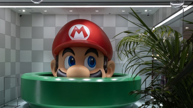 A statue of the Nintendo Co. video-game Super Mario Brothers character Mario on display inside a Takashiyama department store in Kyoto, Japan, on Friday, Nov. 3, 2023. Nintendo is scheduled to release its second-quarter earnings figures on Nov. 7. Photographer: Buddhika Weerasinghe/Bloomberg