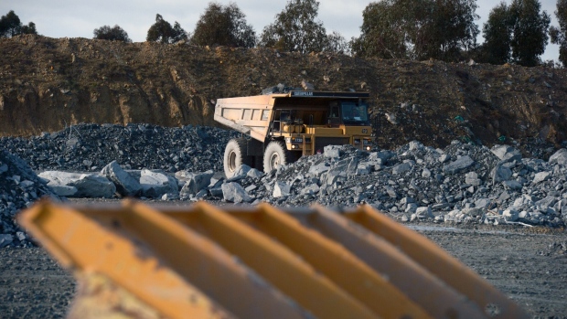 A Caterpillar Inc. dump truck operates at a run-of-mine (ROM) pad of the Kirkland Lake Gold Ltd. Fosterville Gold Mine in Bendigo, Victoria, Australia, on Friday, Aug. 9, 2019. As prices soar, production in the goldfields of Victoria state is rising again and has already climbed to the highest since 1914 as mining companies dig deeper and new technology helps to uncover once hidden and richer deposits in a region that almost rivaled the Californian gold rush and was thought to have petered out decades ago. Photographer: Carla Gottgens/Bloomberg
