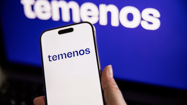 A Temenos AG logo on a smartphone arranged in Budapest, Hungary, on Friday, Feb. 16, 2024. Temenos was a target of activist investors even before a report by Hindenburg Research led to the biggest drop in 15 years in the Swiss banking software company’s shares. Photographer: Akos Stiller/Bloomberg