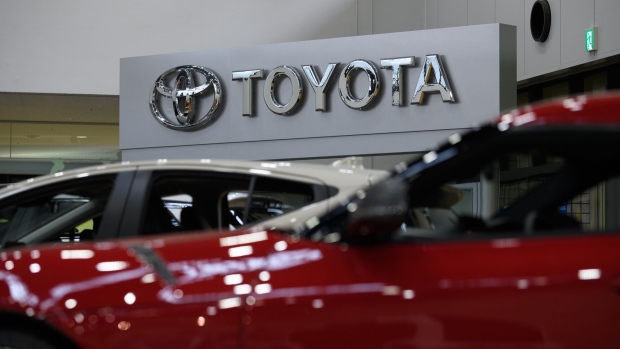 The Toyota Motor Corp. logo displayed at the company's showroom in Toyota City, Aichi Prefecture, Japan, on Monday, June 13, 2022. Toyota will hold its annual shareholders' meeting on June 15. Photographer: Akio Kon/Bloomberg