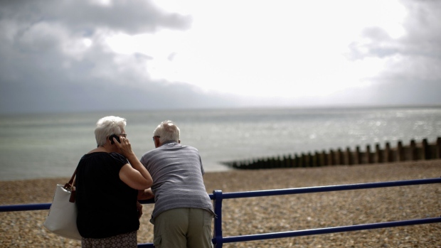 Visitors at the seafront in Eastbourne, U.K. Photographer: Matthew Lloyd