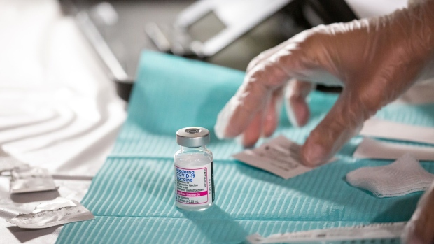 A healthcare worker prepares a dose of the Moderna Covid-19 vaccine in New York. Photographer: Michael Nagle/Bloomberg