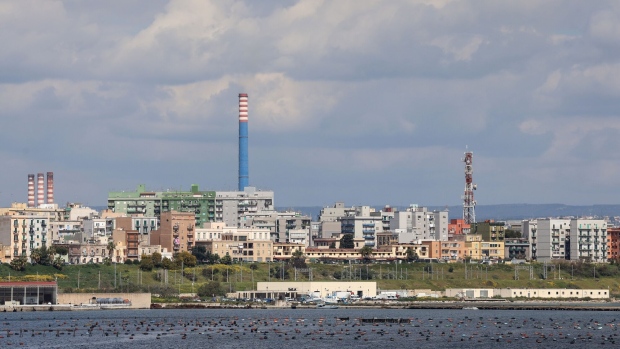 Chimneys of Acciaierie d'Italia steel plant, formerly known as Ilva, in Taranto, Italy, on Thursday, April 6, 2023. Italy’s government is planning to revise up its outlook for 2023 economic growth, envisaging a range of 0.8% to 1% in its latest budget plans, according to people familiar with the matter.