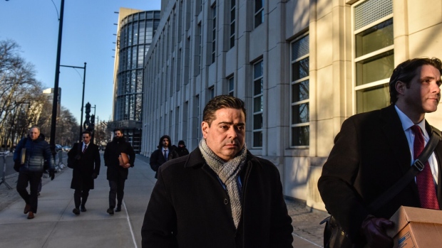 Javier Aguilar, former oil trader for Vitol Group, center, departs federal court in the Brooklyn borough of New York, US, on Tuesday, Feb. 20, 2024. Aguilar is accused of bribing Ecuadorian and Mexican government officials to win more than $500 million in business for Vitol, the world's largest independent oil-trading firm, from state-owned Petroecuador and Petroleos Mexicanos.