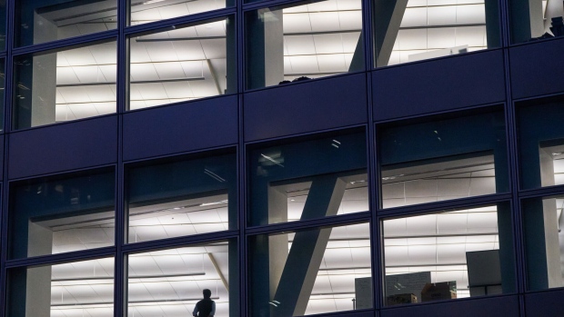 An employee inside the Goldman Sachs headquarters in New York, US. Photographer: Bing Guan/Bloomberg