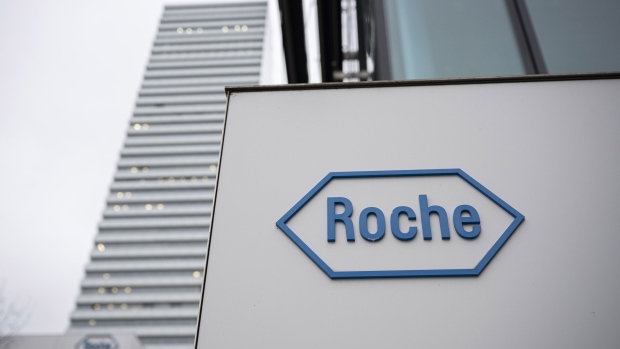 A logo at the Roche Holding AG headquarters in Basel, Switzerland, on Thursday, Feb. 1, 2024. Roche forecast a sluggish recovery in sales and earnings this year as it emerges from a difficult 2023 and a string of research setbacks. Photographer: Pascal Mora/Bloomberg