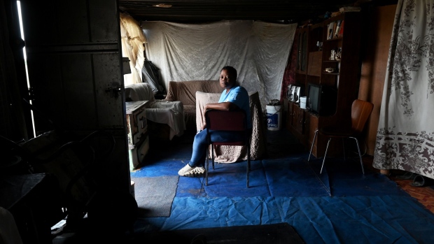 Portia Mofokeng at her home in Mooidraai. Toxins from industrial emissions in the Vaal Triangle are causing respiratory diseases and hundreds of premature deaths every year across the region. Photographer: Leon Sadiki/Bloomberg