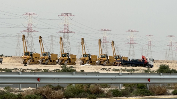 Construction equipment outside QatarEnergy’s Ras Laffan LNG production and export facility. Photographer: Anthony Di Paola/Bloomberg
