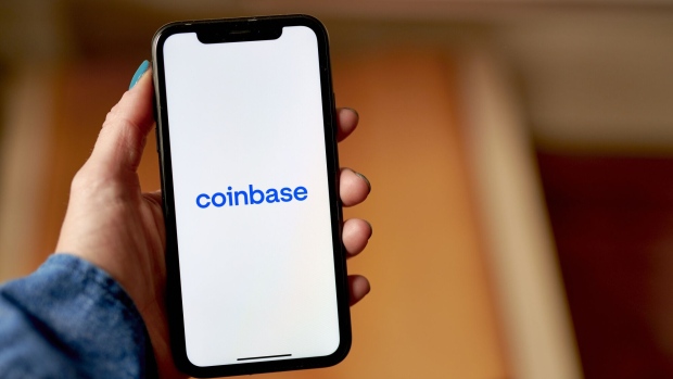 The Coinbase logo on a smartphone arranged in the Brooklyn borough of New York, US, on Wednesday, June 7, 2023. The list of digital tokens deemed as unregistered securities by the Securities and Exchange Commission now spans over $120 billion of crypto after the US agencys lawsuits against Binance Holdings Ltd. and Coinbase Global Inc. Photographer: Gabby Jones/Bloomberg