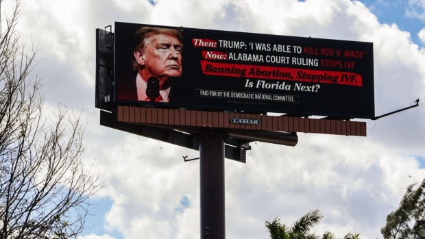 A billboard sponsored by the the Democratic National Committee as seen on Feb. 27, in Miami.