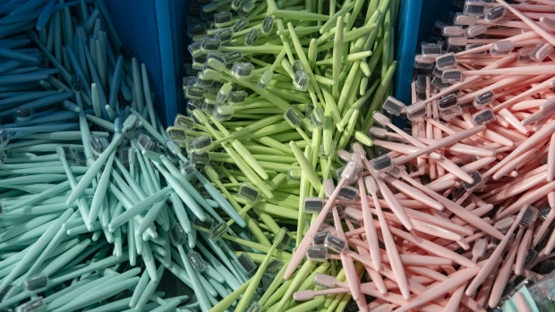 Toothbrushes sit in containers at the Yangzhou Shuguang Toothbrush Factory in Yangzhou, Jiangsu Province, China, on Monday, Sept. 21, 2020. As export orders started plummeting in March amid the coronavirus’s global spread, the Chinese toothbrush maker turned to the domestic market. With the help of Alibaba Group’s huge trove of data on what Chinese consumers are searching for, the company shifted to making products that became local hits. Photographer: Qilai Shen/Bloomberg