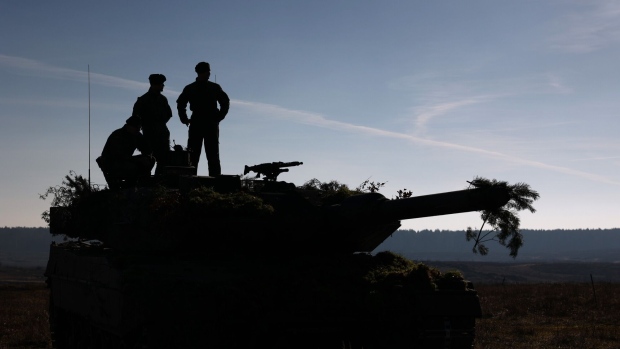 <p>Soldiers on a tank turret during the North Atlantic Treaty Organization (NATO) Brilliant Jump 2024 exercise in Drawsko Pomorskie, Poland, on Feb. 26.</p>