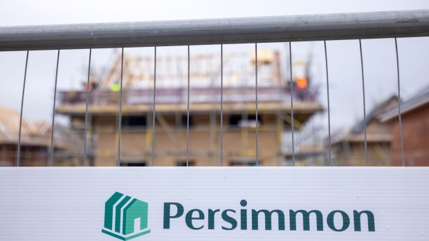 <p>A Persimmon Plc residential property construction site in Braintree, UK, on March 11.</p>