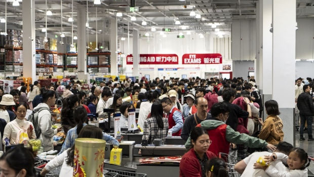 <p>Shoppers at the check-out counters of the Costco Wholesale Corp. store in Shenzhen, China, on Jan. 14.</p>