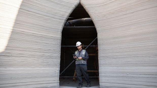 An Icon worker at a structure built by Phoenix. Photographer: Thomas Allison/Bloomberg