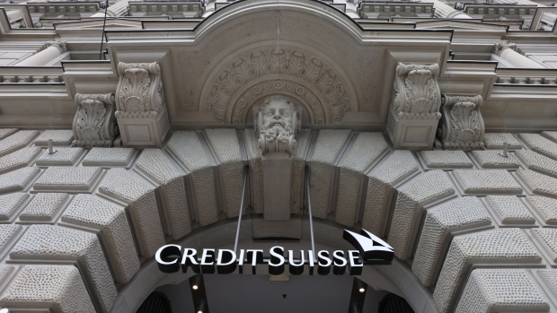 A logo above the entrance to the Credit Suisse Group AG headquarters in Zurich, Switzerland, on Thursday, Aug. 31, 2023. UBS posted the biggest-ever quarterly profit for a bank in the second quarter as a result of its emergency takeover of Credit Suisse, and confirmed that it would fully integrate the local business of its former rival by next year. Photographer: Arnd Wiegmann/Bloomberg
